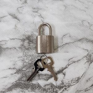 Authentic Louis Vuitton Silver Lock and Keys